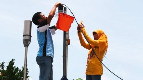 Air sampling in Palangka Raya, Borneo, Indonesia