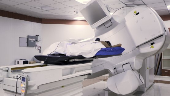 A person receiving radiotherapy treatment for liver cancer in Mumbai.